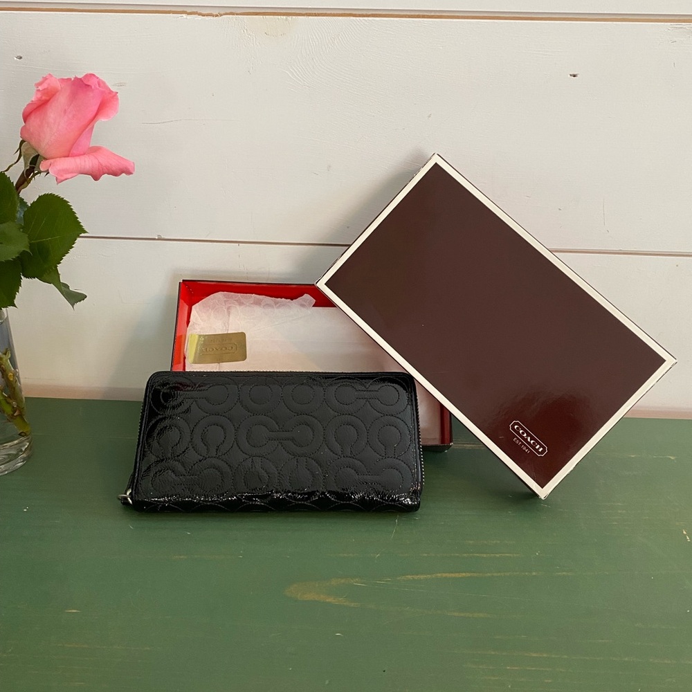 Coach Black Embossed Wallet retails $120 like new